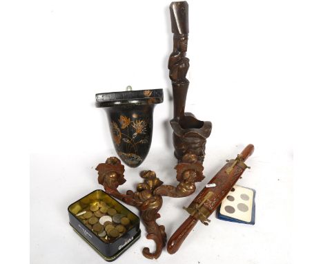 A painted and gilded wooden wall pocket, height 24cm, a giltwood wall sconce, a Folk Art candle holder, pre-decimal British c