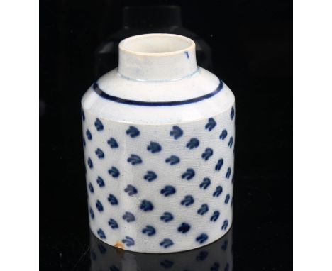 An 18th century English blue and white porcelain tea caddy, hand painted crow's foot decoration with blue bird mark on base, 