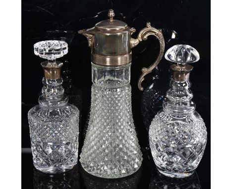 2 silver-mounted glass decanters, comprising Garrard and Mappin &amp; Webb, and a silver plated glass jug (3) 