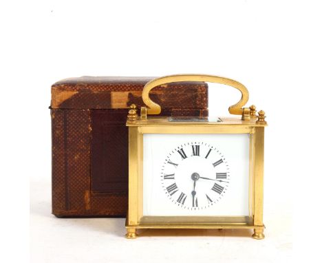 A small French rectangular brass-cased carriage clock, in fitted case, case height 8cm, working order, with key and leather t