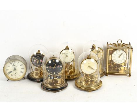 5 x 400-day clocks under glass domes, another, and an alarm clock, height 11cm 