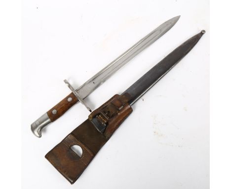 A First World War Period German Neuhausen bayonet and scabbard, no. 140632, blade length 30cm 