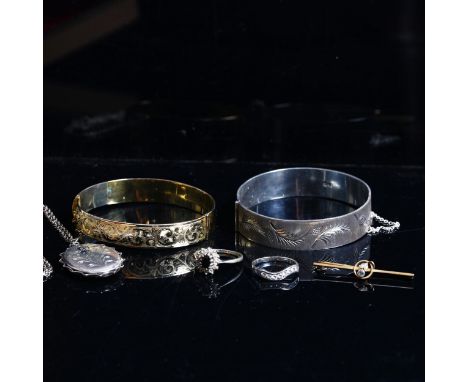 A 9ct gold bar brooch, set with aquamarine and seed pearl, an engraved silver bangle, a floral engraved silver locket and cha