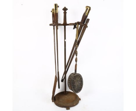 A set of First World War Period bayonet fireside tools, on cast-iron stand 