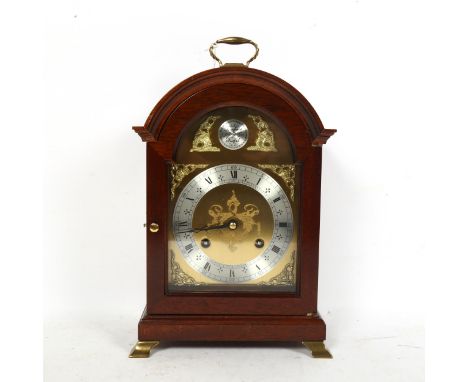 A reproduction mahogany dome-top bracket clock, by Comitti of London, with movement striking on a bell, case height 26cm, wor