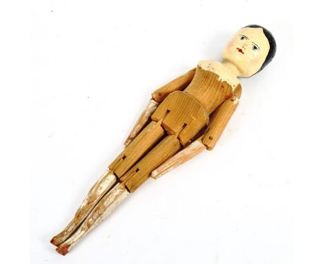 A Folk Art painted peg doll, height 29cm 