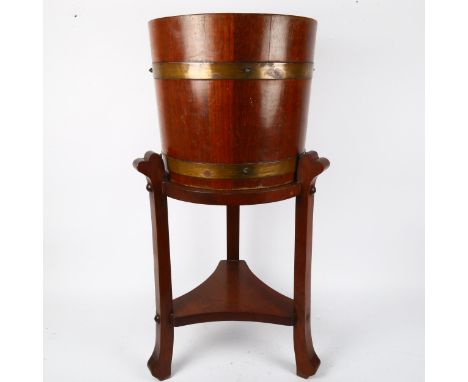 R A Lister &amp; Co Limited coopered oak jardiniere on stand, overall height 71cm 