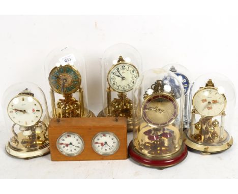 6 x 400-day clocks under glass domes, and an Alpha chess clock (7) 