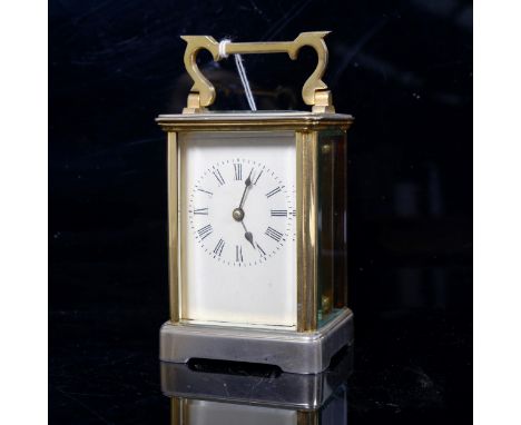A brass-cased carriage clock, case height 11cm, working order, no key 