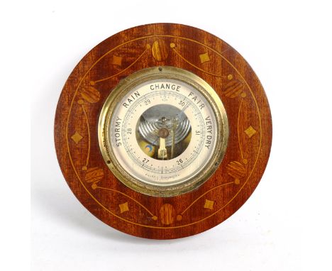 An early 20th century aneroid wall barometer, diameter 20cm 