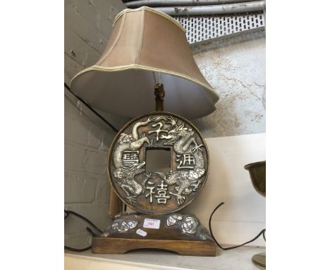 A reproduction Chinese style table lamp. 