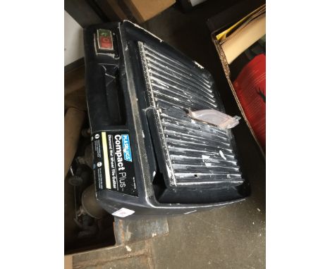 A tile cutter 