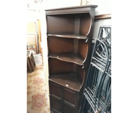 An Ercol corner cupboard. 