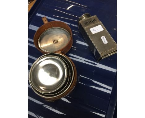 A vintage travel stove in leather case and travel lamp 