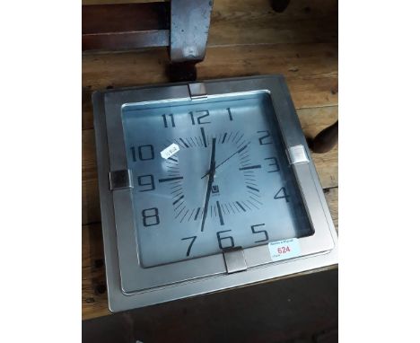 A modern Umbra square wall clock 29cm x 29cm. 