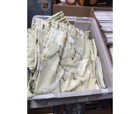 A box containing two pairs of curtains 