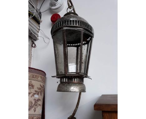 A metal hanging lantern. 