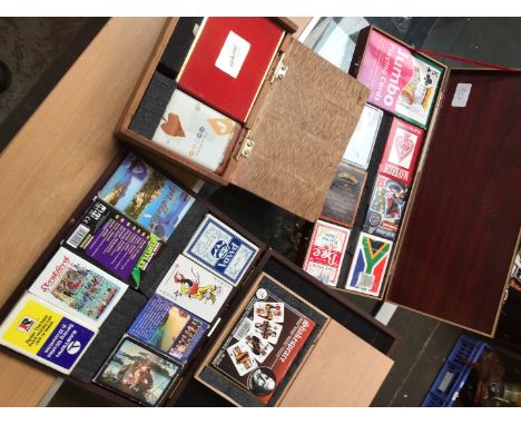 4 wooden boxes of various playing cards 