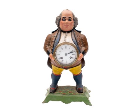 Bramley &amp; Hubbard an American painted cast iron mantel clock modelled as a Georgian gentleman with a French eight-day dur