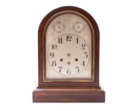 An Edwardian German mantel clock with movement and associated parts the eight-day duration movement chiming on four gongs wit