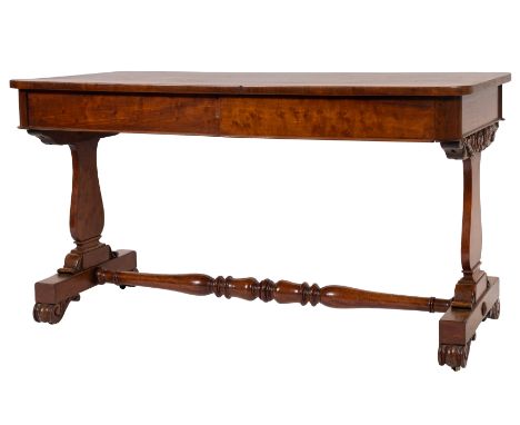 A Regency or George IV mahogany sofa or library table, circa 1820; the rectangular top with rounded corners; with one drawer 