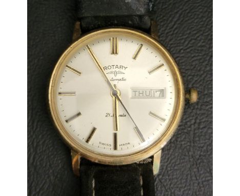 GENTLEMAN'S NINE CARAT GOLD CASED ROTARY AUTOMATIC WRISTWATCH1970s, the dial with baton five minute markers and day/date aper