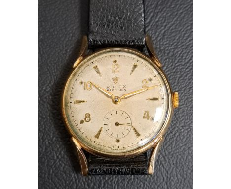 GENTLEMEN'S VINTAGE ROLEX PRECISION NINE CARAT GOLD CASED WRISTWATCHcirca 1940s, the dial with alternating Arabic numerals an