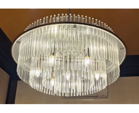 UNUSUAL CIRCULAR CHANDELIER CEILING LIGHTwith a pierced Perspex mount with two hundred and eighteen varying length glass rods