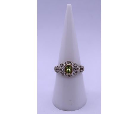 9ct gold peridot and diamond ring - Size N 