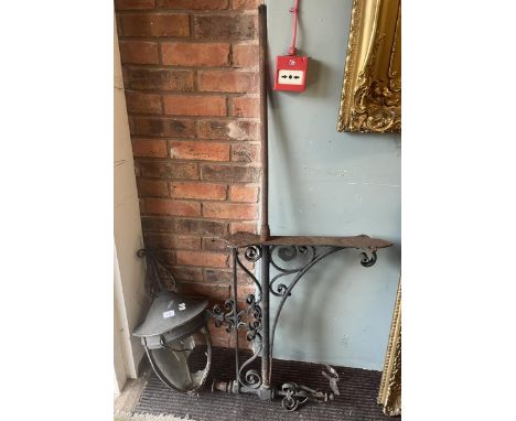 Wrought iron wall bracket together with exterior wall light 