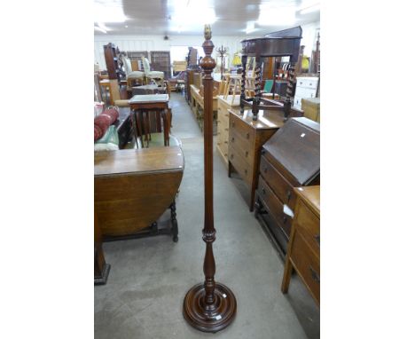 A mahogany standard lamp
