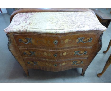 A French Louis XV style inlaid kingwood and ormolu mounted commode, with serpentine marble top