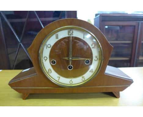 A 1950's German walnut mantel clock