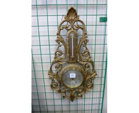 A gilt aneroid barometer