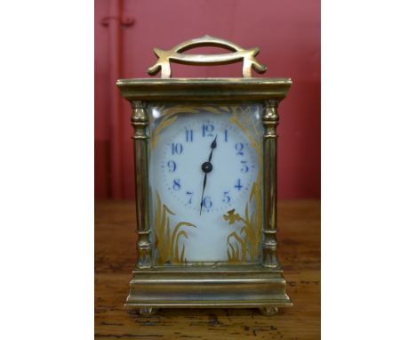 A French Art Nouveau brass carriage clock