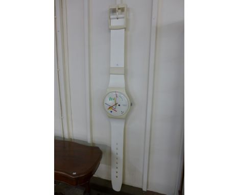 A 1980's Swatch wristwatch wall clock