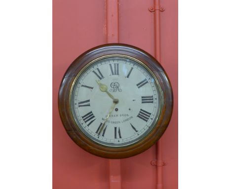A mahogany fusee circular wall clock, the painted dial signed GR V, Ingram Bros., Wood Green, London