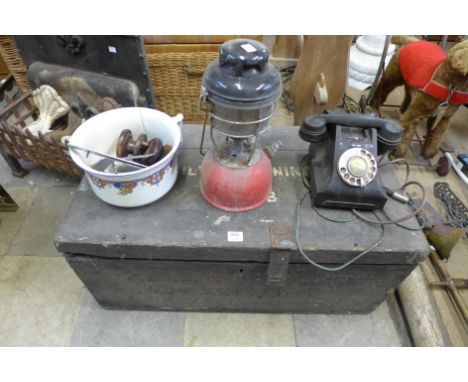 A tilly lamp, Bakelite telephone, fishing reels, etc.