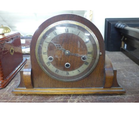 An oak mantel clock