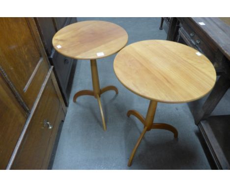 A pair of sycamore tripod tables