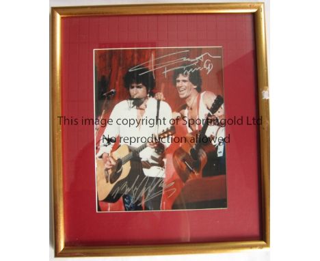 BOB DYLAN / KEITH RICHARDS / AUTOGRAPHS      A 10" X 8" framed and glazed colour picture of both artists on stage from 1985 L