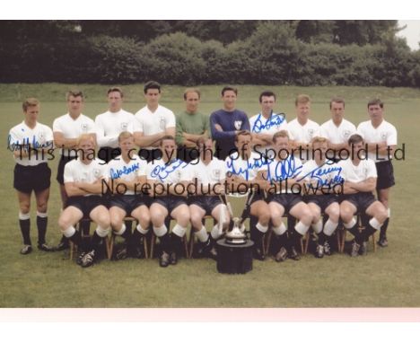 TOTTENHAM 1963   Col 12 x 8 photo of the 1963 ECWC winners posing with their trophy during a photo-shoot at their training gr