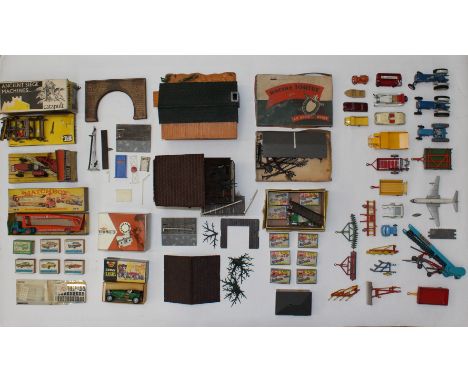 Diecast: A collection of assorted diecast vehicles to include: Corgi, Matchbox, Britains and other examples, assorted buildin