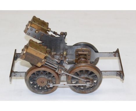 Model Railway: A 3.5" gauge 0-4-0 tank locomotive chassis. Appears in good order. Length approx. 26cm. Together with another 