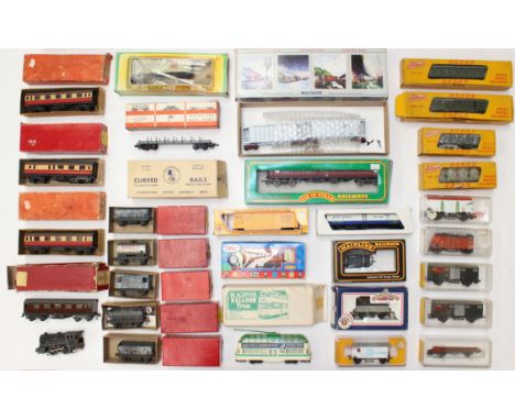 Model Railway: A collection of assorted boxed OO Gauge model railway rolling stock, to include: Trix, Liliput, Mainline, Bach