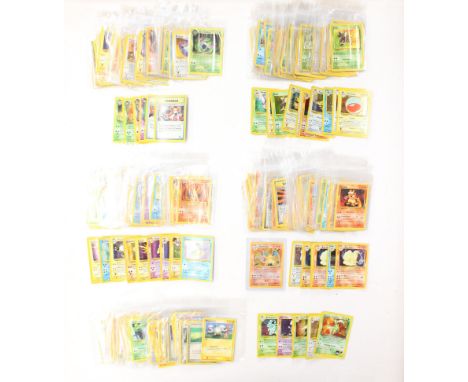 Pokemon: A collection of assorted Pokemon cards to comprise Wizards of the Coast cards, Base, Fossil, Jungle, Team Rocket and