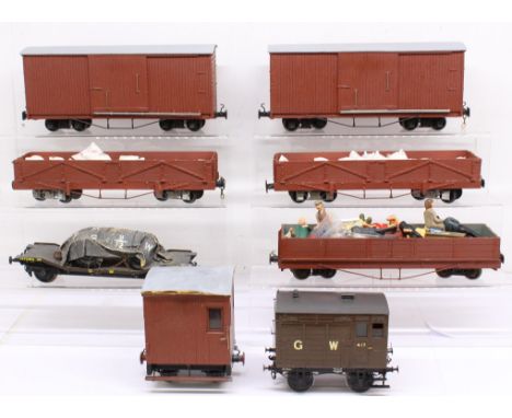 Model Railway: A collection of eight unboxed model railway kit built rolling stock including wagons and brake vans. Generally