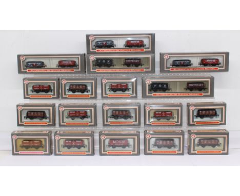 Model Railway: A collection of eighteen boxed, OO Gauge, Dapol rolling stock, varying examples. General condition is very goo