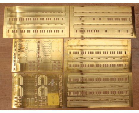 Model Railway: A collection of six sheets of uncut coach sheets, manufactured by Barrett, appears to be for a rake of four co