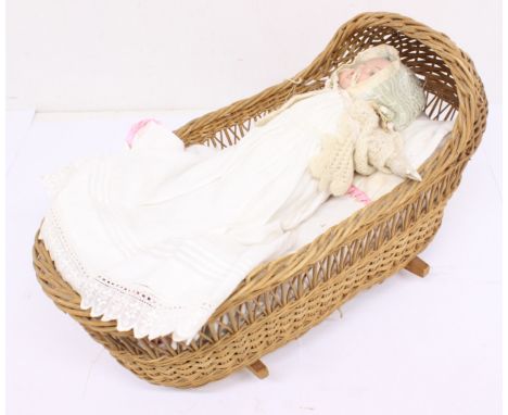 Doll: A bisque head doll, marked 'H.E.H. 60 6' to the back of the head with pipe clay arms, cloth body. Doll is original, clo